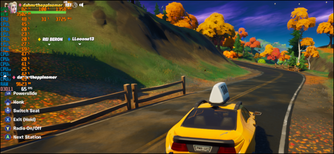 A yellow taxi driving down a rolling autumn country road in the game Fortnite.