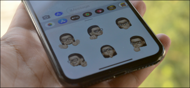 iPhone User Using Memoji Stickers