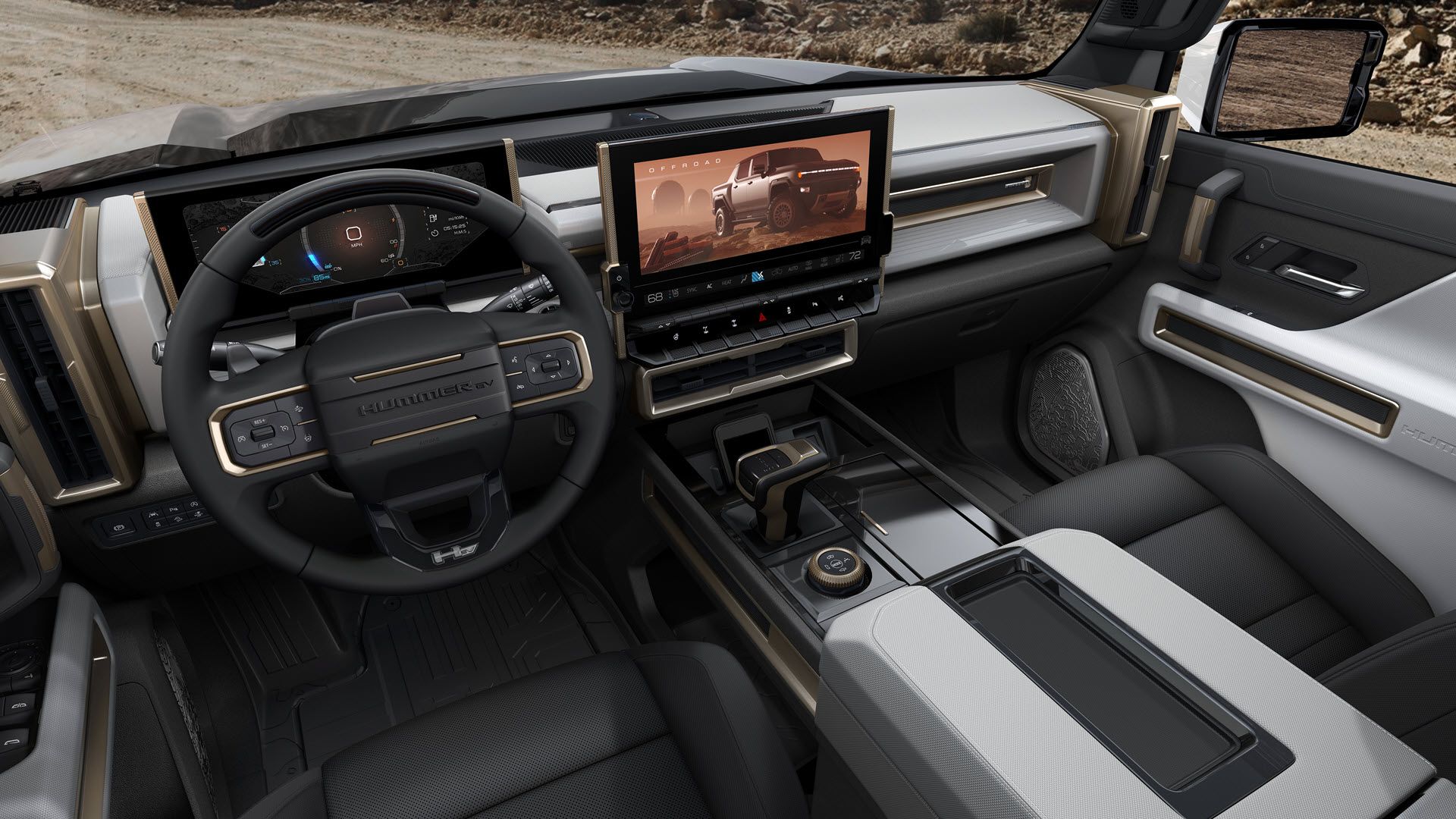 The interior of a HUmmer EV, with a large horizontal touchscreen.