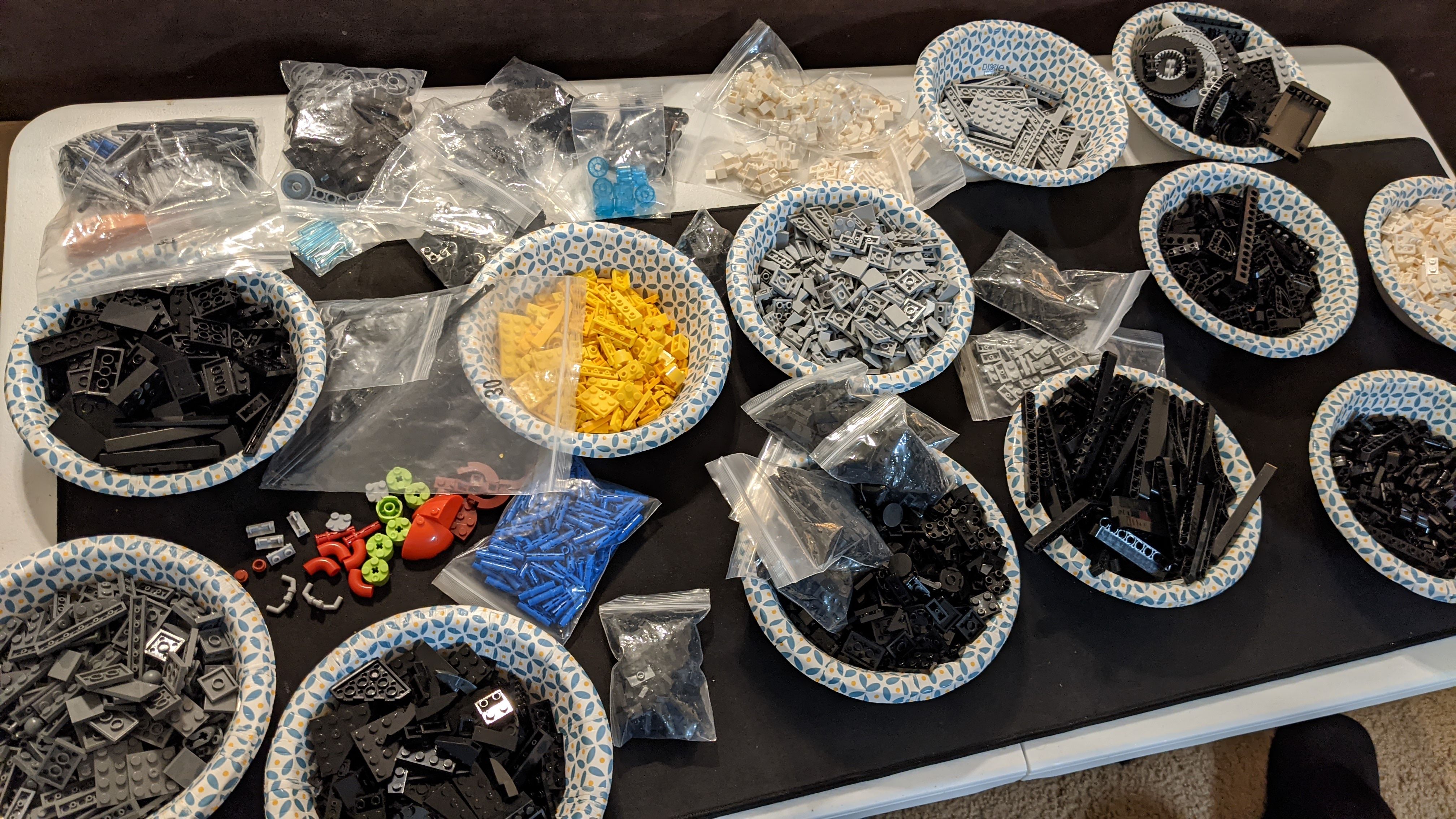 LEGO pieces arranged into bowls 