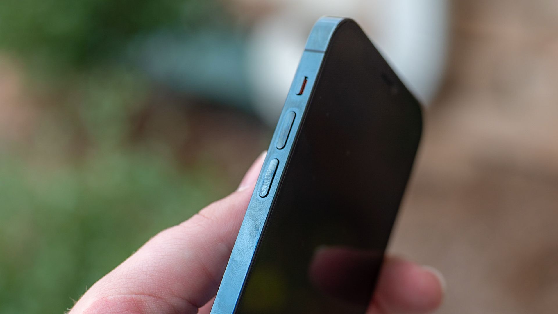 The iPhone 12 Pro's fingerprint magnet stainless steel side