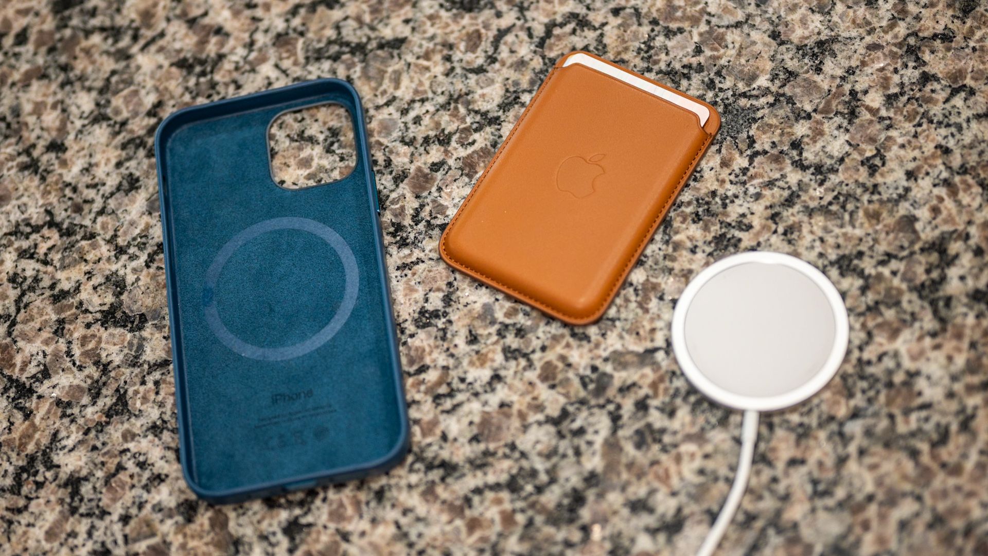 Apple's MagSafe charger, leather wallet, and case for the iPhone 12 Pro