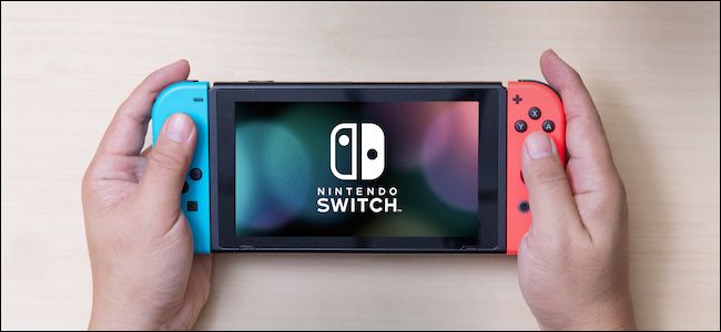 Nintendo Switch console in-hand