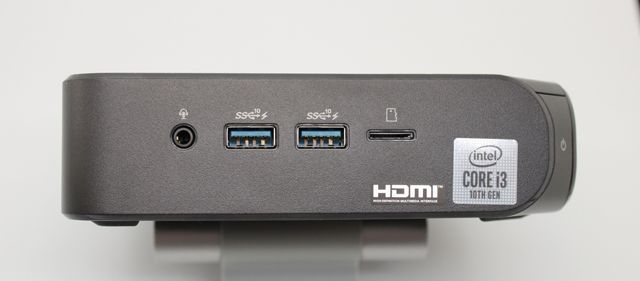 Photo of Chromebox 4's front panel showing ports, SD Card slot and headphone/mic jack