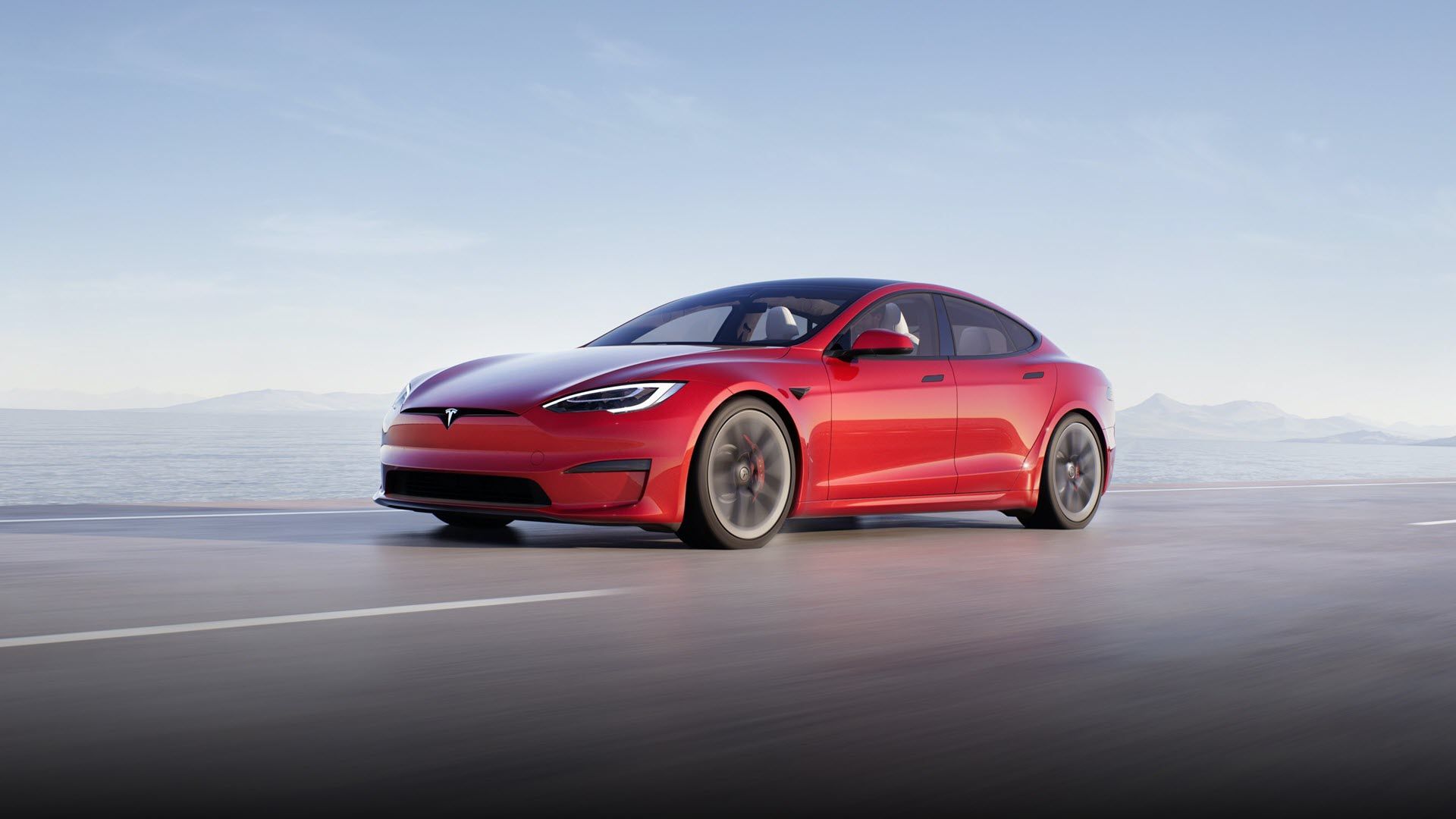 A red Tesla Model S car.