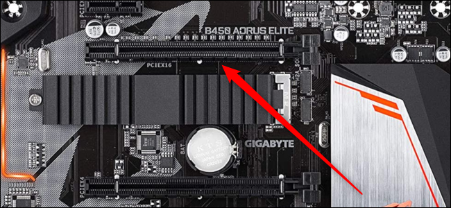 Close-up of a PCIe x16 slot with a red arrow pointing to it.