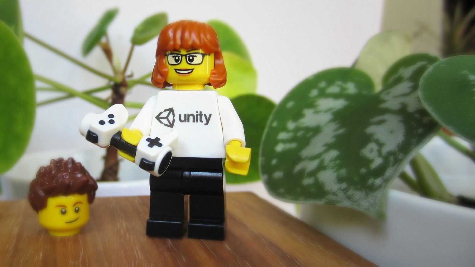 A custom LEGO minifig wearing a Unity-branded shirt.