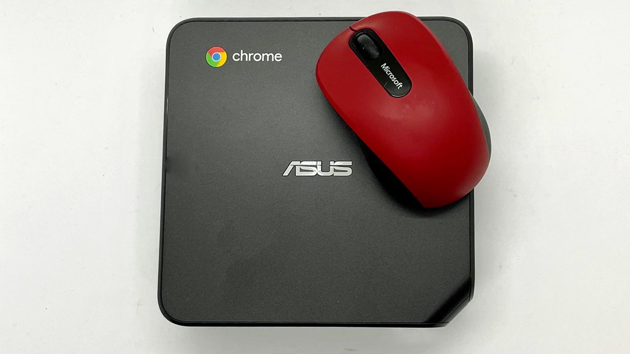 Image of a mouse laying on top of the Chromebox