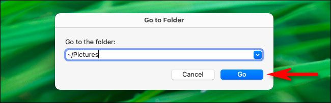 In the "Go to Folder" window, type "~/Pictures" and click "Go."