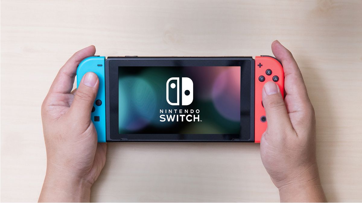Person playing a game on a Nintendo Switch
