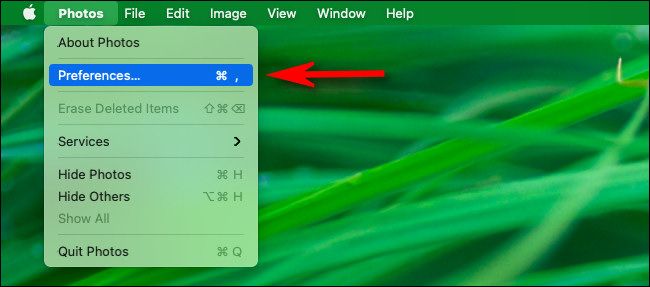 In the menu bar, click "Photos" then select "Preferences" from the menu.
