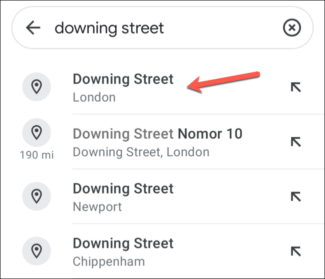 To drop a pin automatically in Google Maps on mobile devices, search for a location using the search bar, then tap on one of the search suggestions underneath.