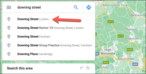 To drop a pin automatically, open Google Maps and use the search bar in the top left to find a location.