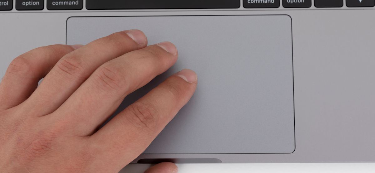 MacBook User Enabling Tap To Click For Trackpad