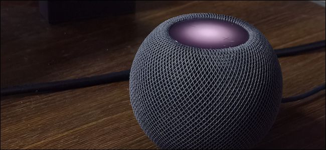 Apple HomePod Mini with visible touch controls visible