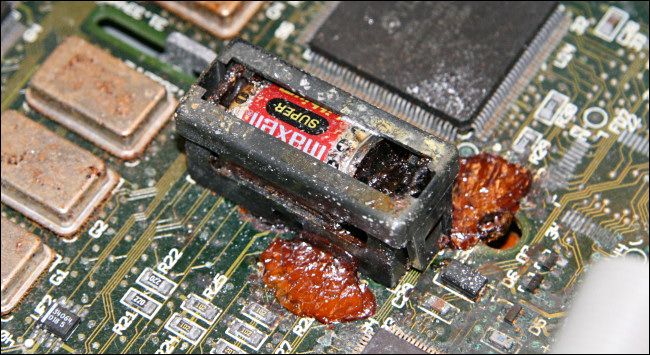 A clock battery leaking in a Mac IIsi.