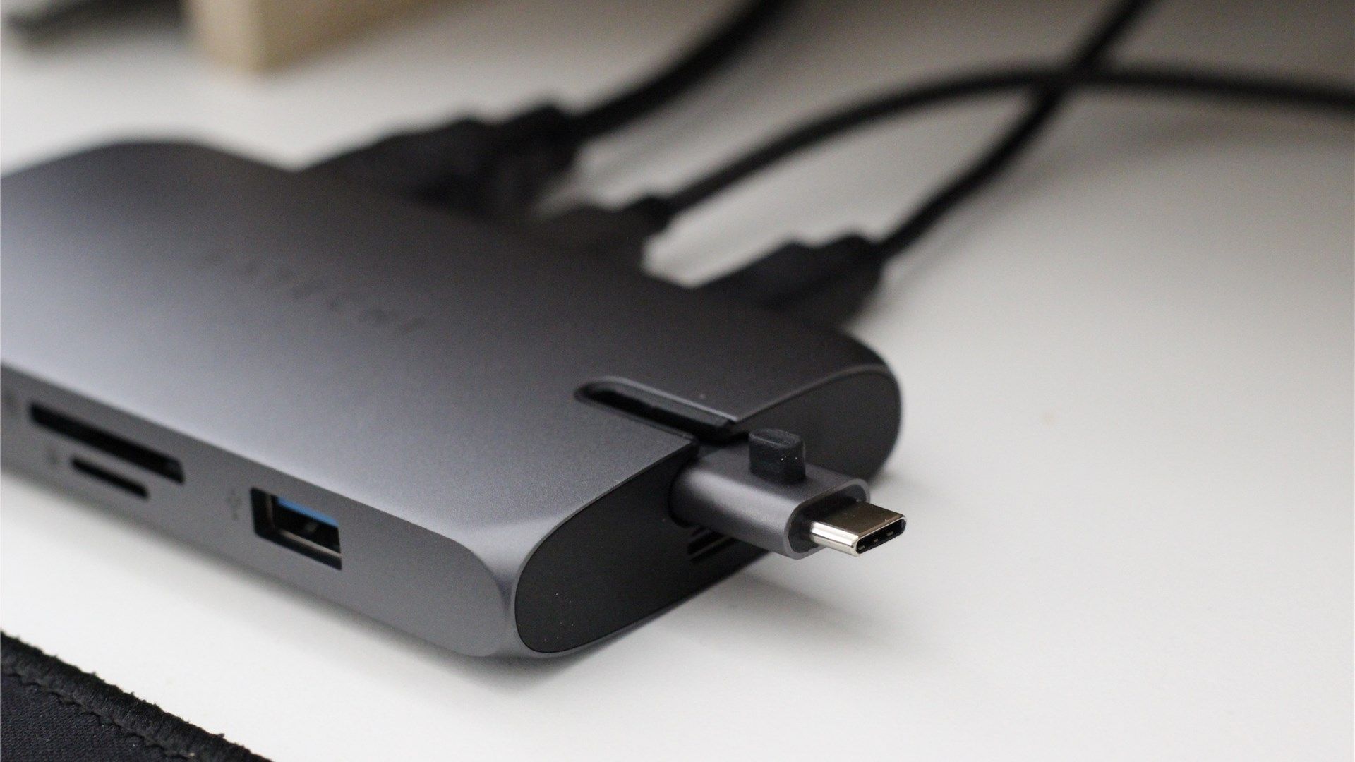 The Satechi hub with the hideaway USB-C cable slightly extended 