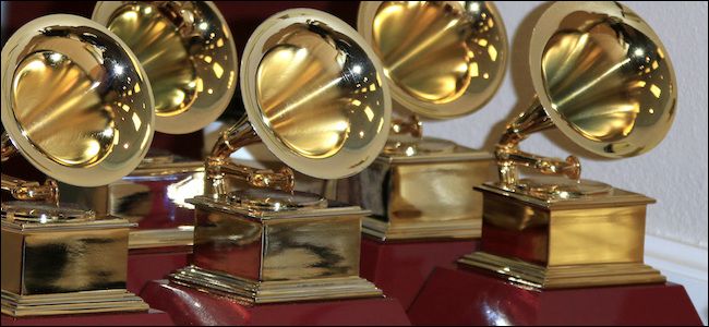 Grammy awards lined up on a table