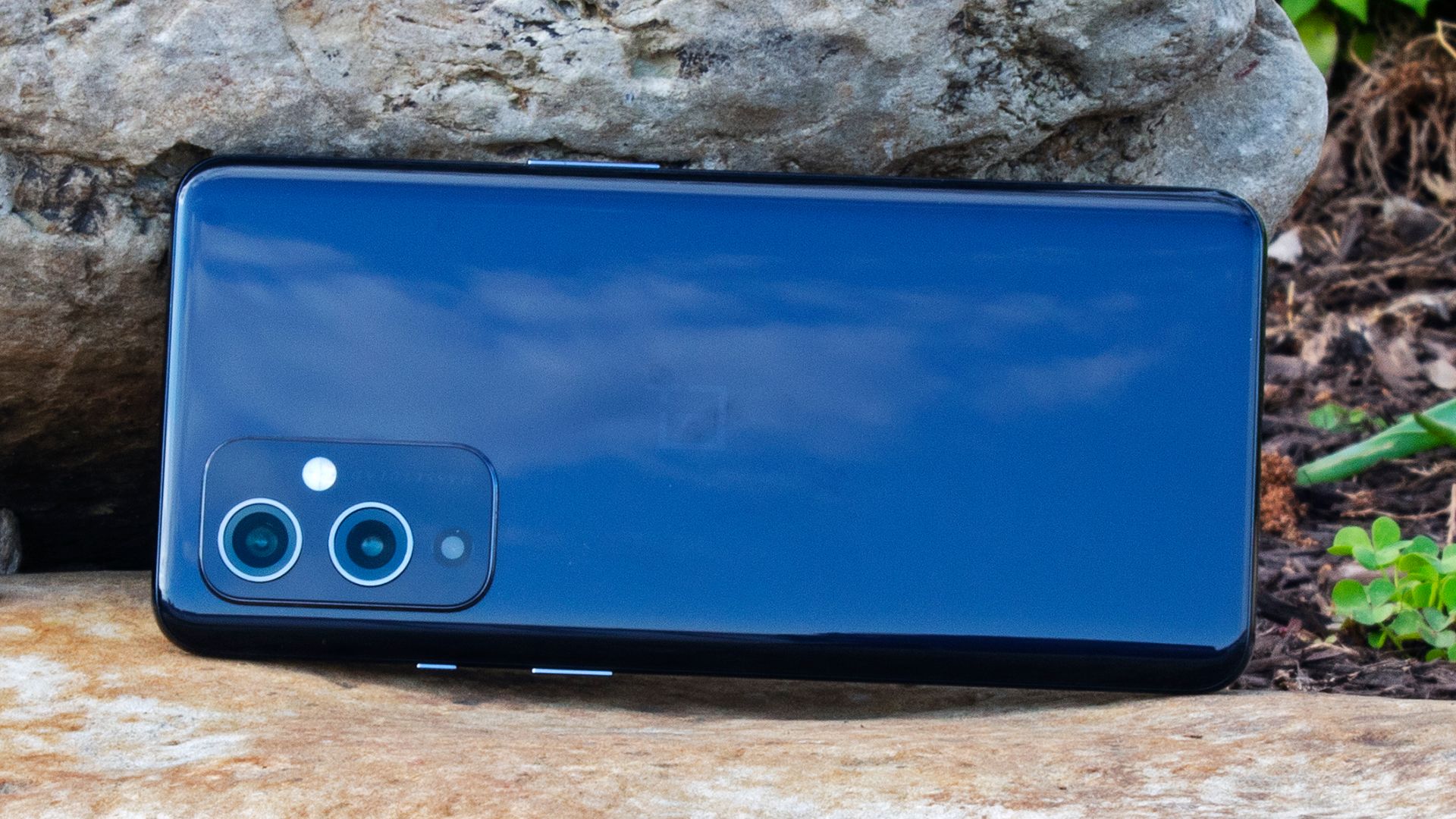 The backside of a OnePlus 9 pro showing a dual-camera arrangement.