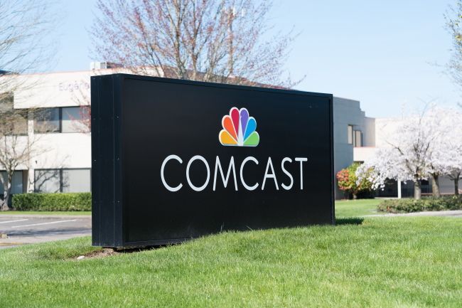 A Comcast sign outside a company building.