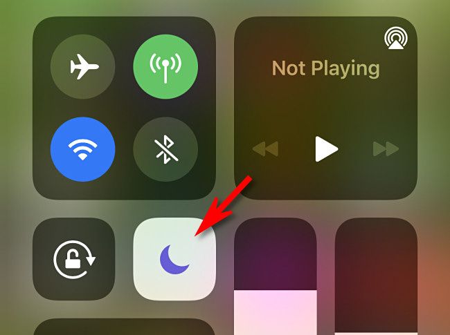 In iPhone Control Center, tap the Do Not Disturb Button, which looks like a crescent moon.