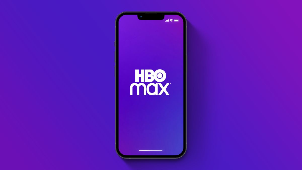 HBO Max logo on an iPhone 13 Pro with a purple gradient background.