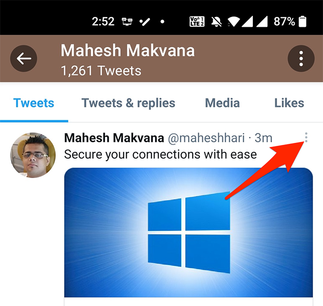 Tap the three dots at the top-right corner of a tweet in Twitter's mobile app.