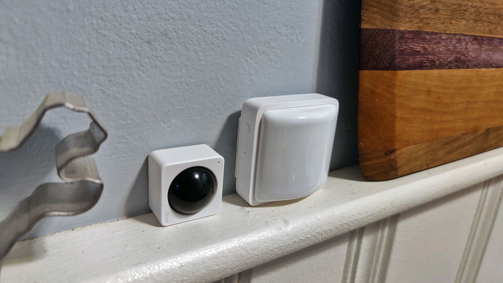 Wyze's Home Monitoring camera a motion system on a shelf.