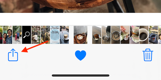 Tap the Share button in the Photos app.