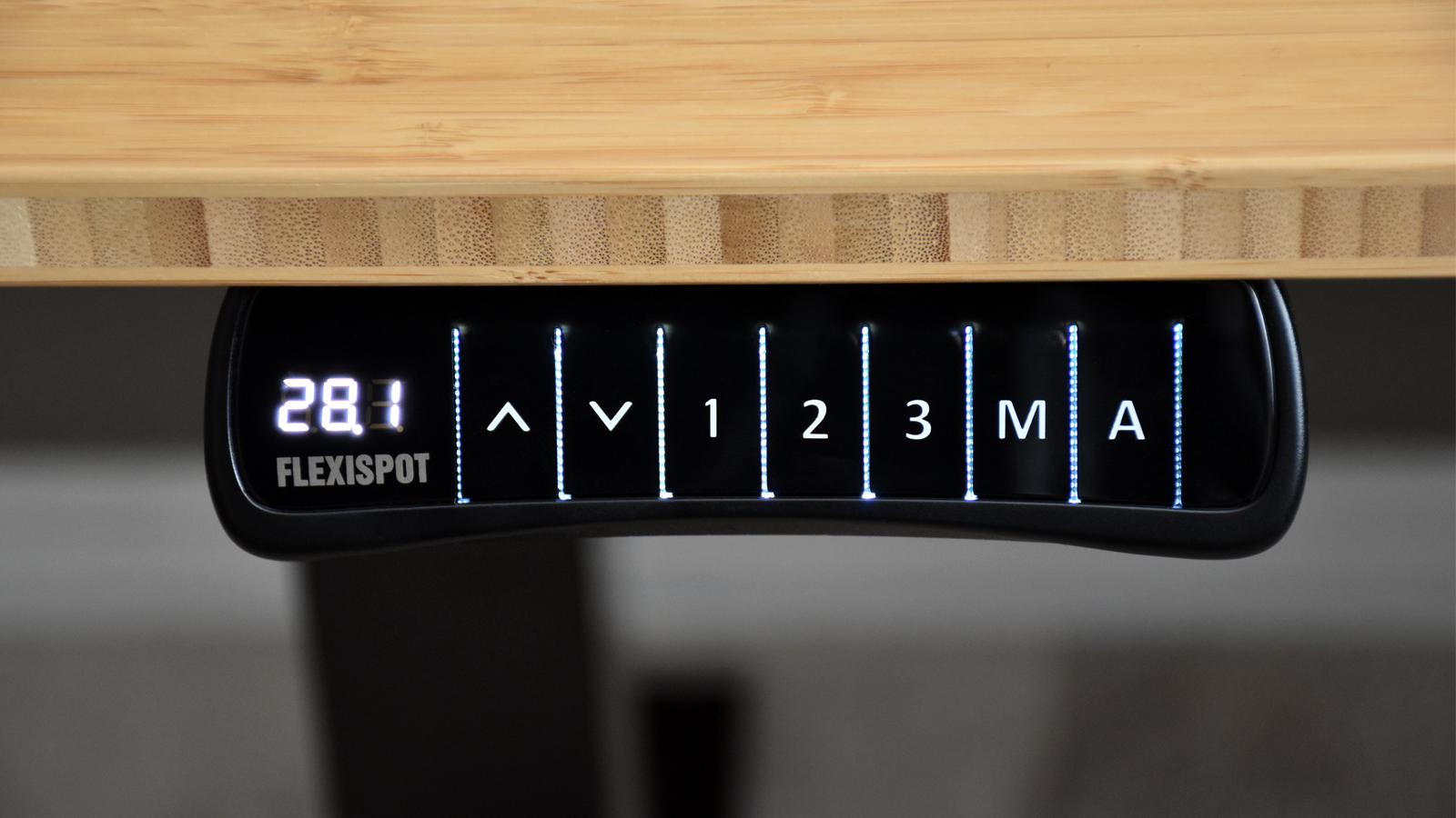 Close-up of the Flexispot Kana's hand switch control panel with LED display and preset buttons