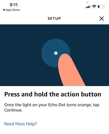 The Alexa app asking the user to press and hold the action button.