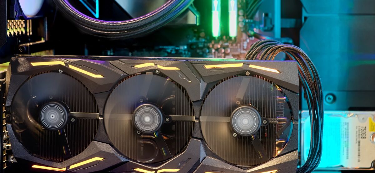 A GPU card with spinning fans.