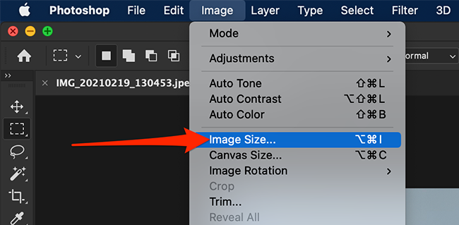 Select "Image > Image Size" from Photoshop's menu bar.