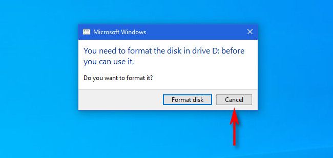 If Windows 10 asks you to format a Mac disk, click "Cancel."