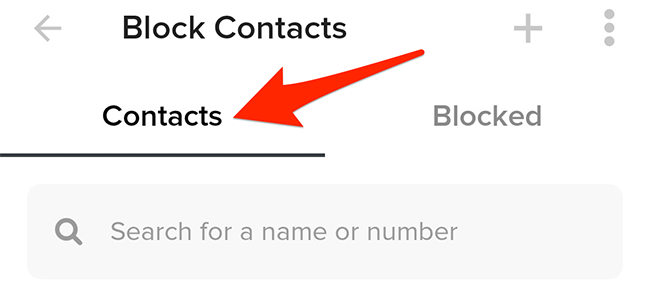Open the "Contacts" tab on Tinder's "Blocked Contacts" screen.