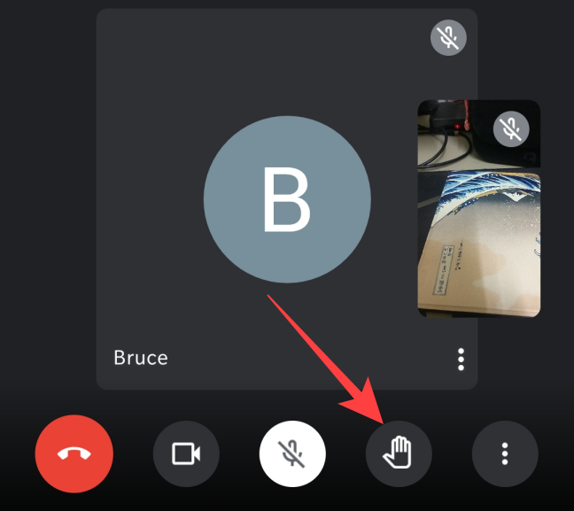 During an ongoing meeting on iPhone or Android, tap on the "Raise hand" button at the bottom of the screen.