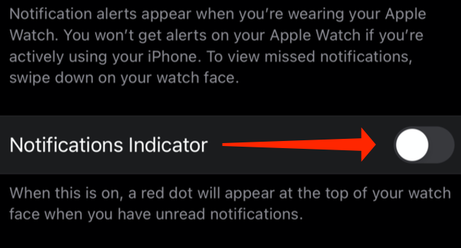 Tap the switch next to “Notifications Indicator” on the iPhone's Watch app, to hide the red dot on your Apple Watch.