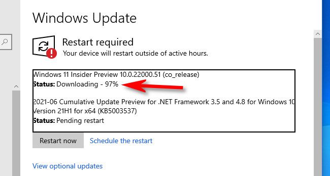 You'll see the Windows 11 Preview download progress in Windows Update.