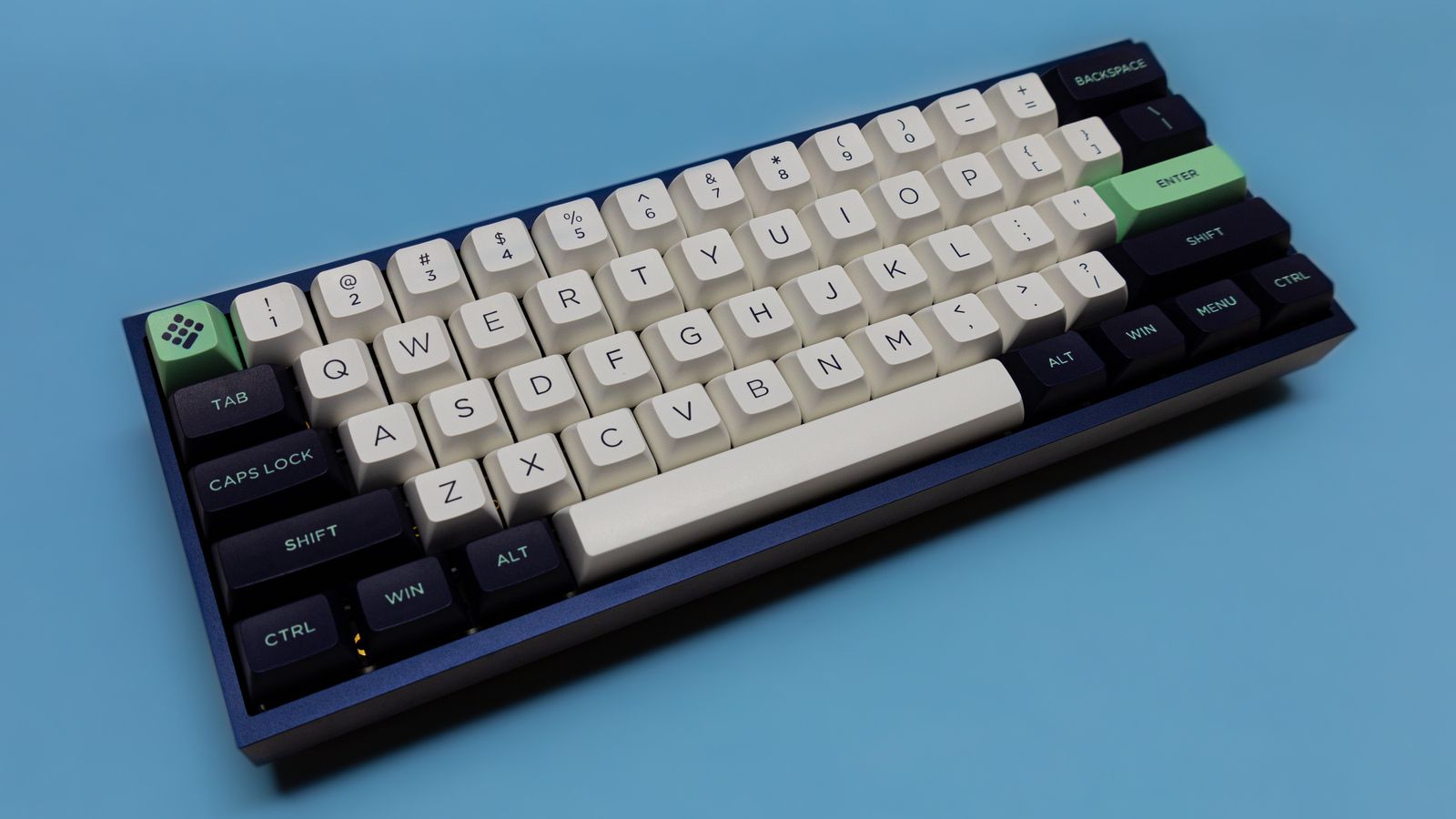 60% mechanical keyboard against blue background