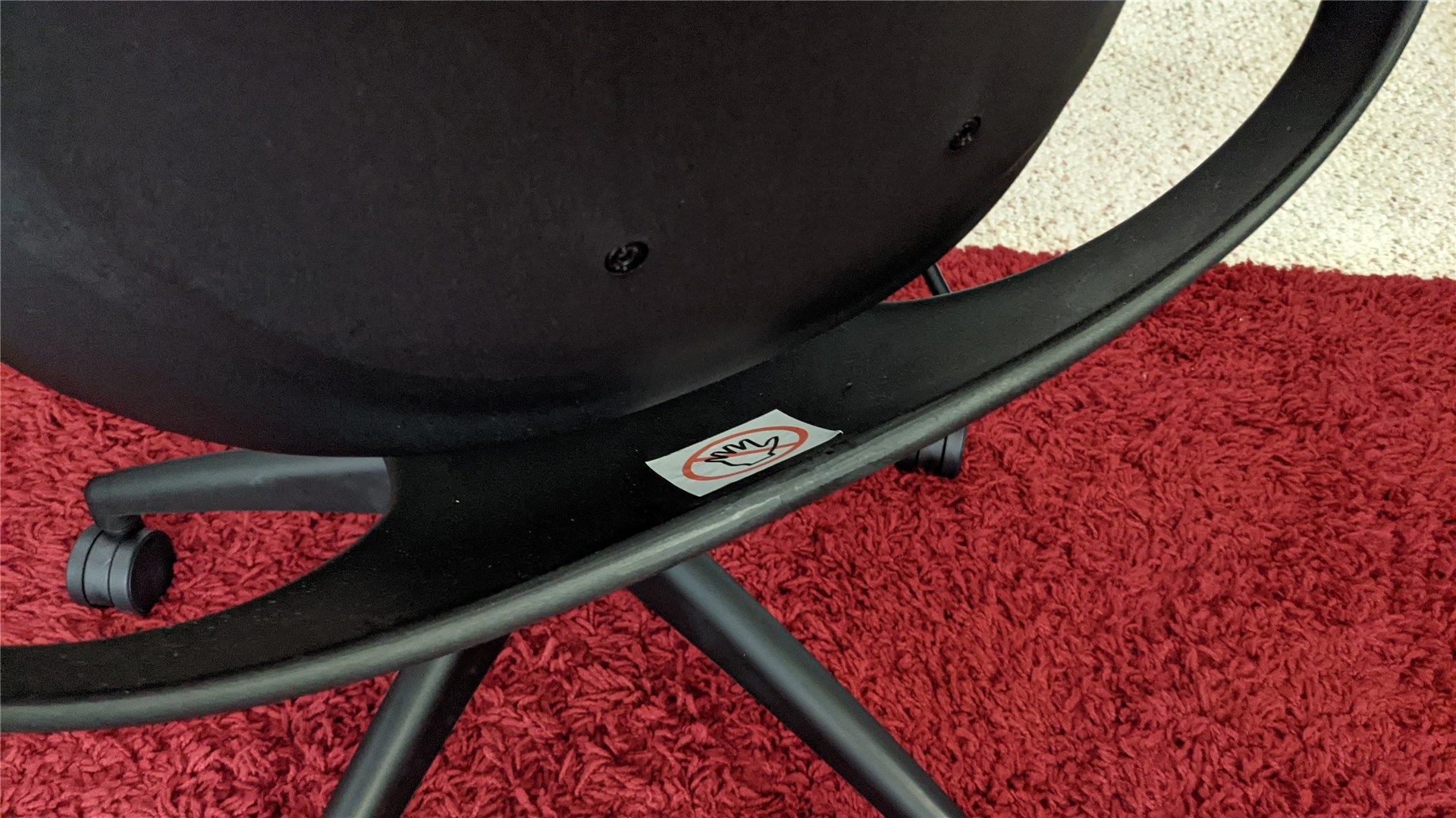 An image of the back of the chair showing where the smaller portion rocks