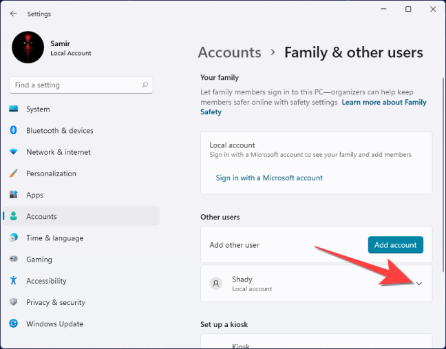 Select the drop-down next to the user account.
