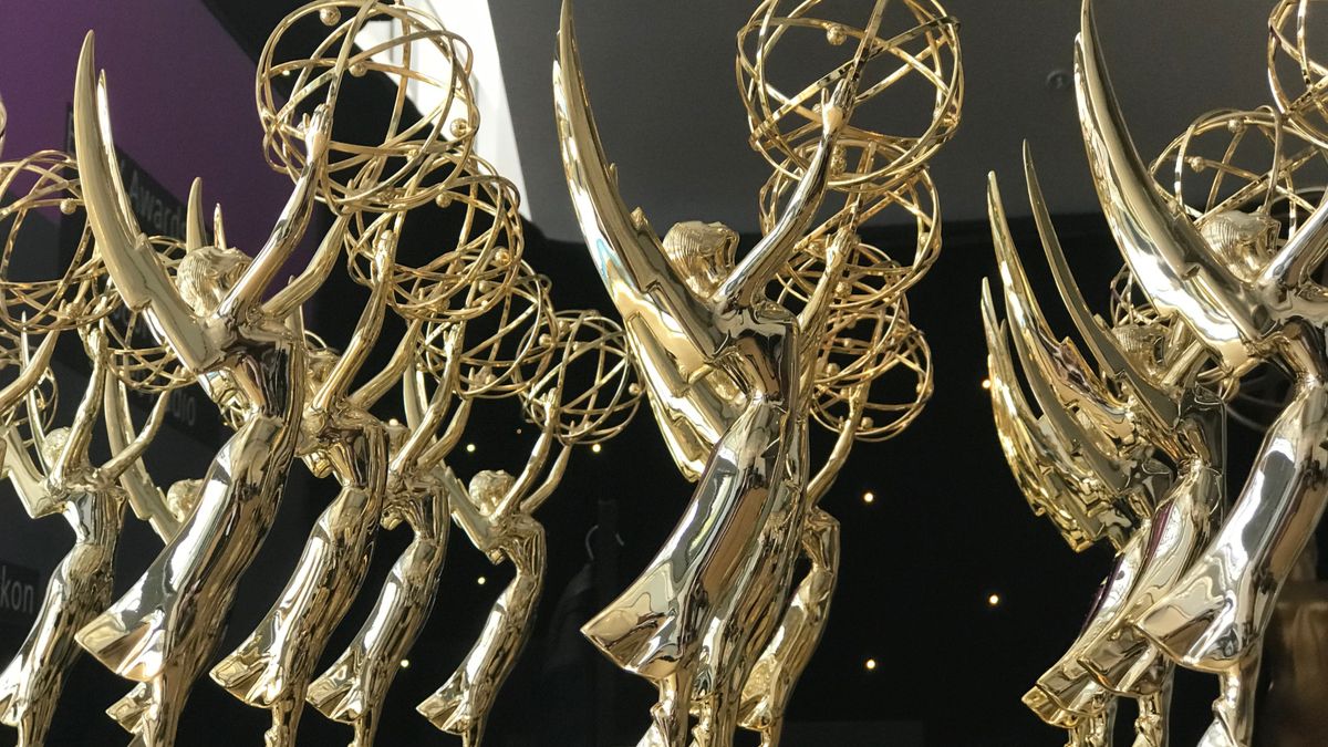 Emmy awards lined up on a table