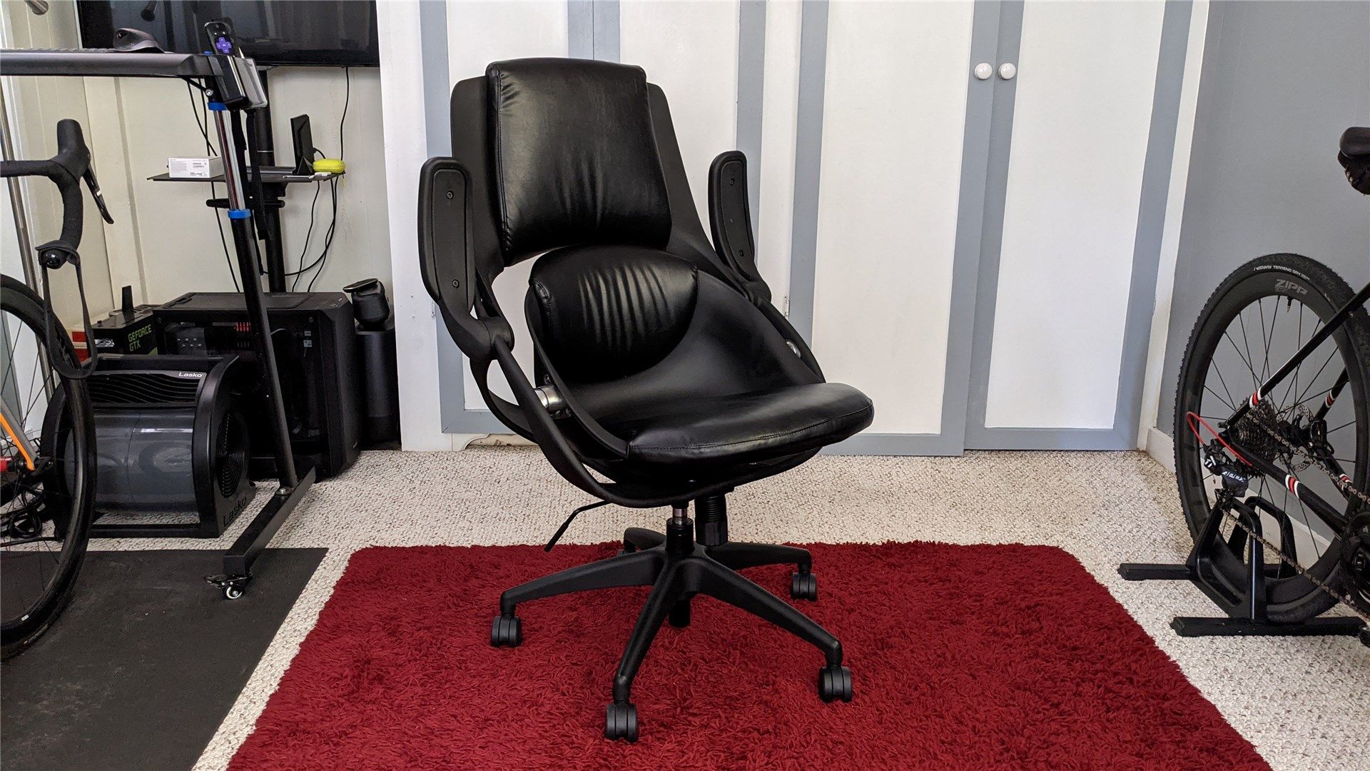 The BackStrong C1 chair with the arms up