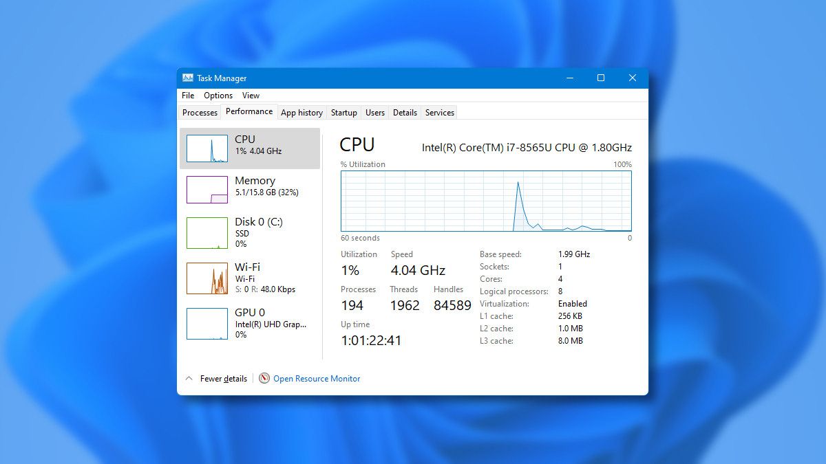 Task Manager in Windows 11 on a blue background