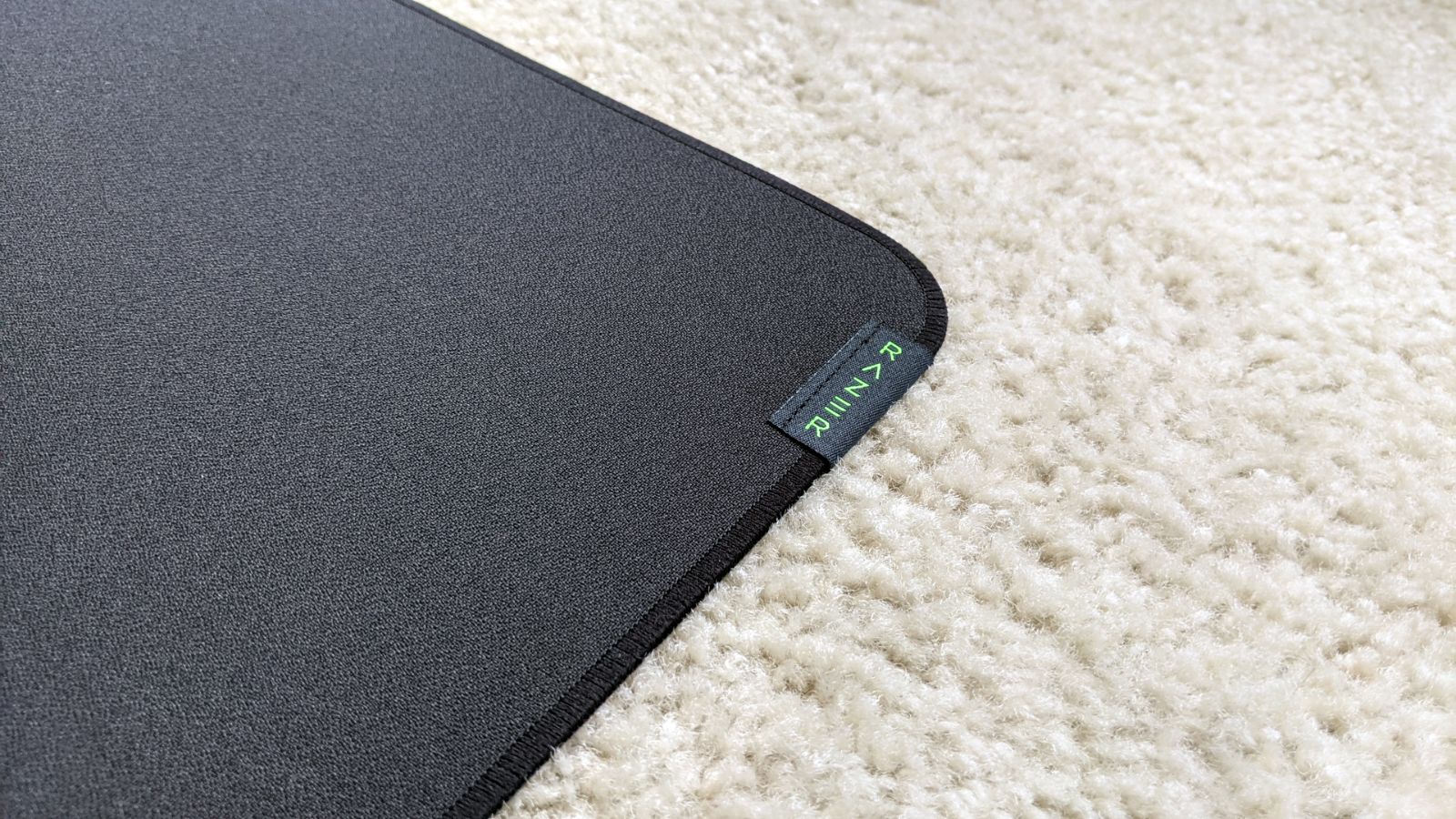 Close-up of Razer Strider mousepad stitched edge