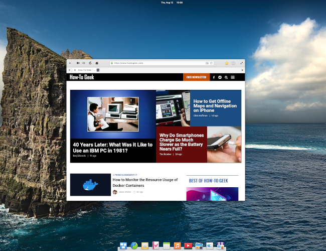 Elementary OS 6 desktop with web browser displaying HowToGeek.com