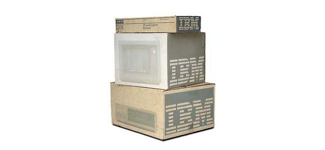 An IBM PC, monitor, and keyboard in original boxes.