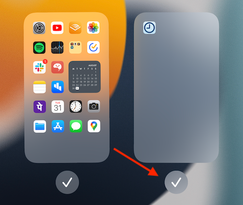 Tap the Checkmark button below the home screen page that you want to remove.