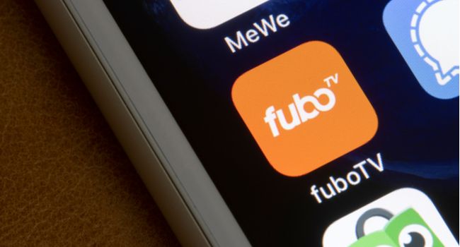 Fubo TV app logo on a smartphone