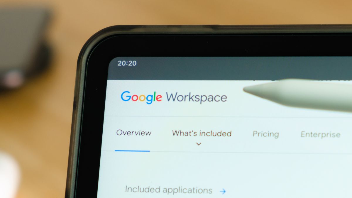 Google Workspace logo in corner of tablet screen with pen